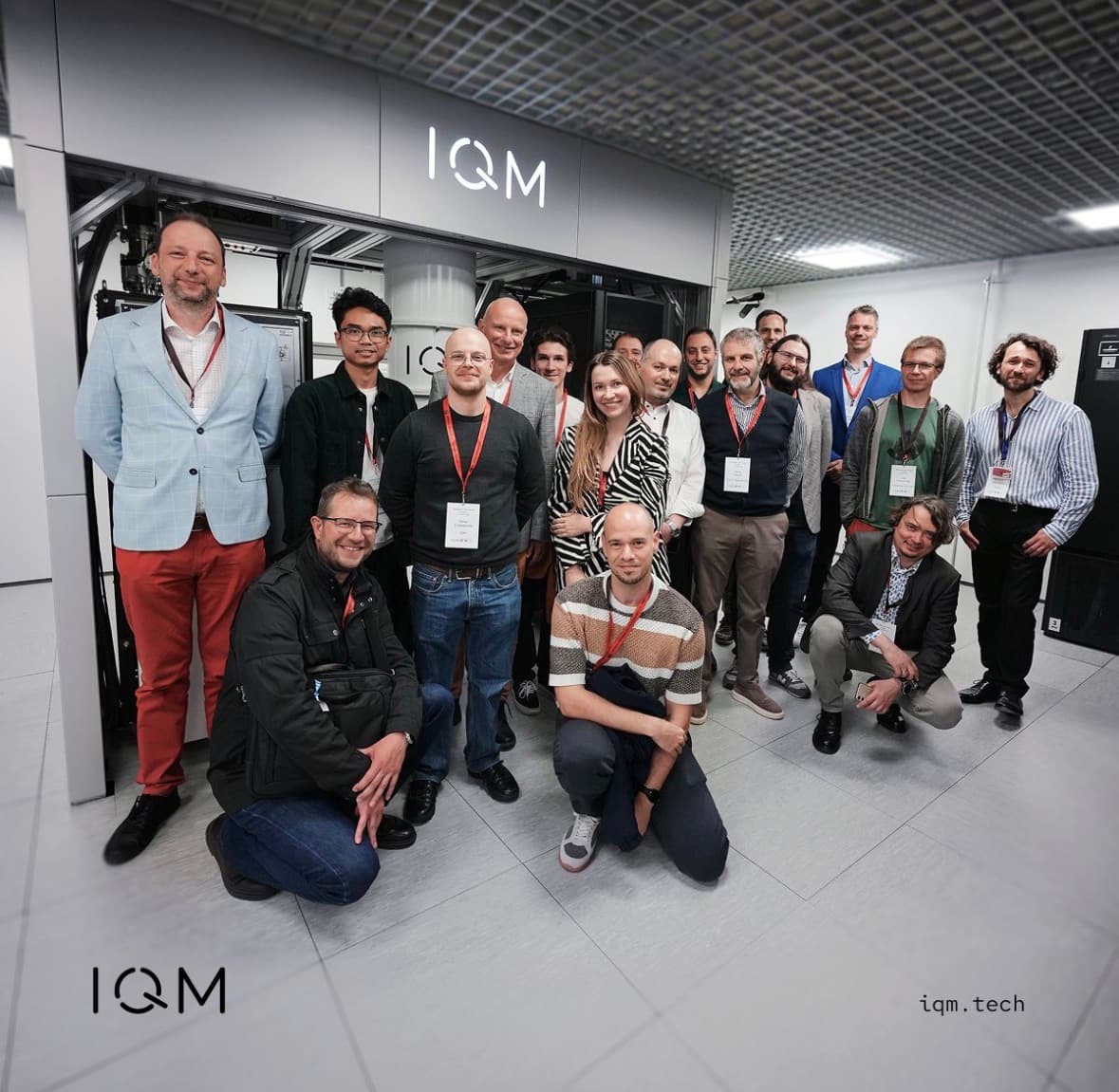 Quantum computing team in front of the IQM quantum computer